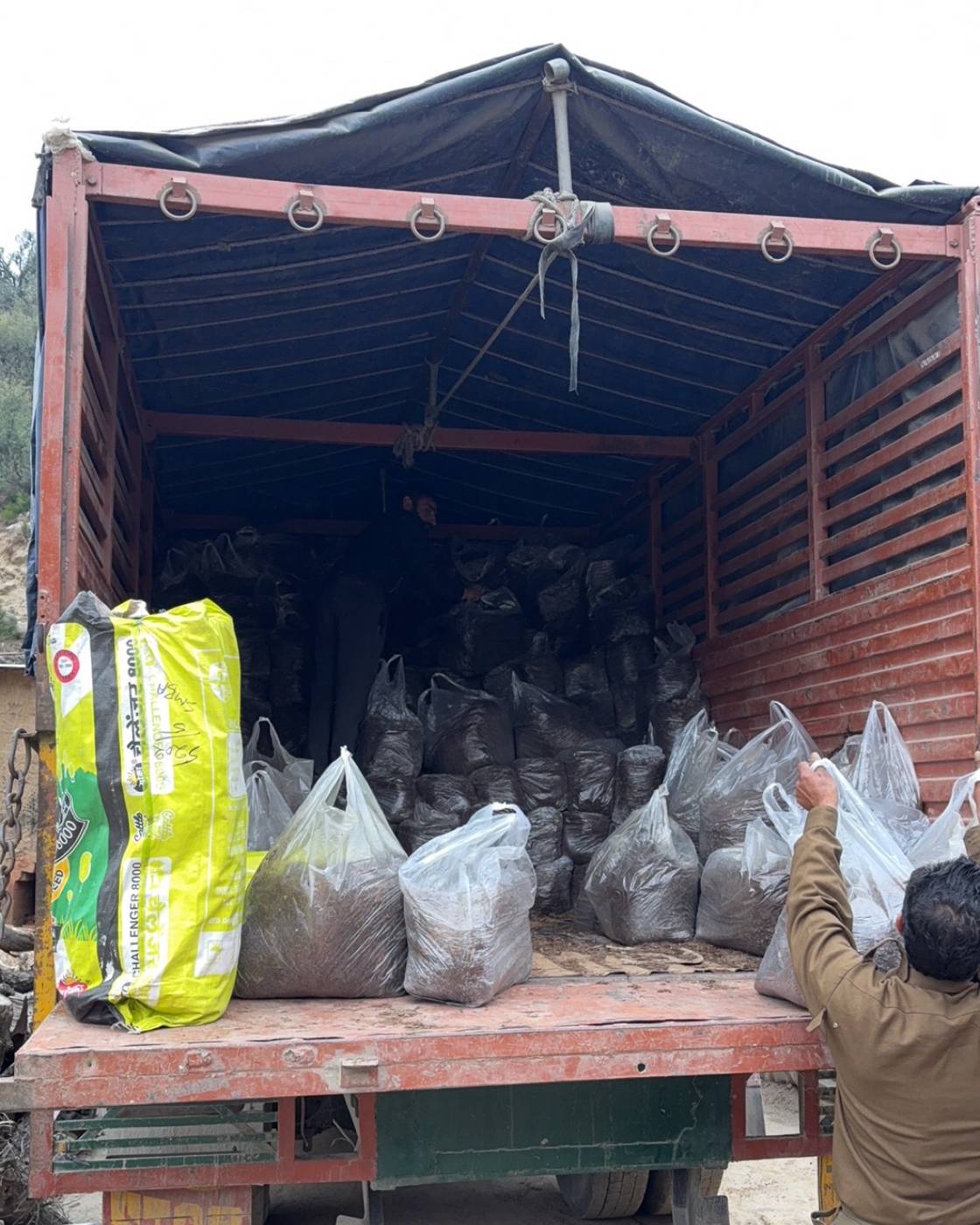 Corrugated metal compost yard